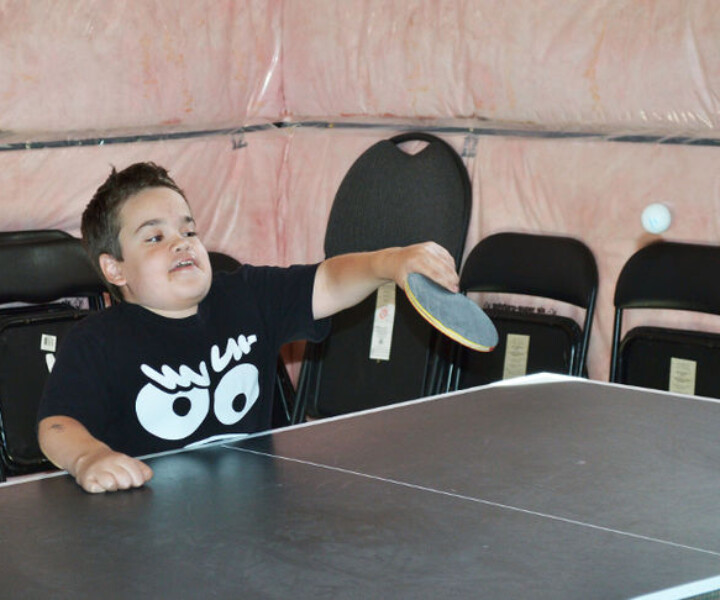 Stefan Gacic shows the leaps of progress he’s made with Morquio A by displaying his ping-pong skills. JUSTIN FORD/Special to the Londoner